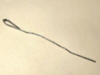 B&uuml;roklammer gebogen